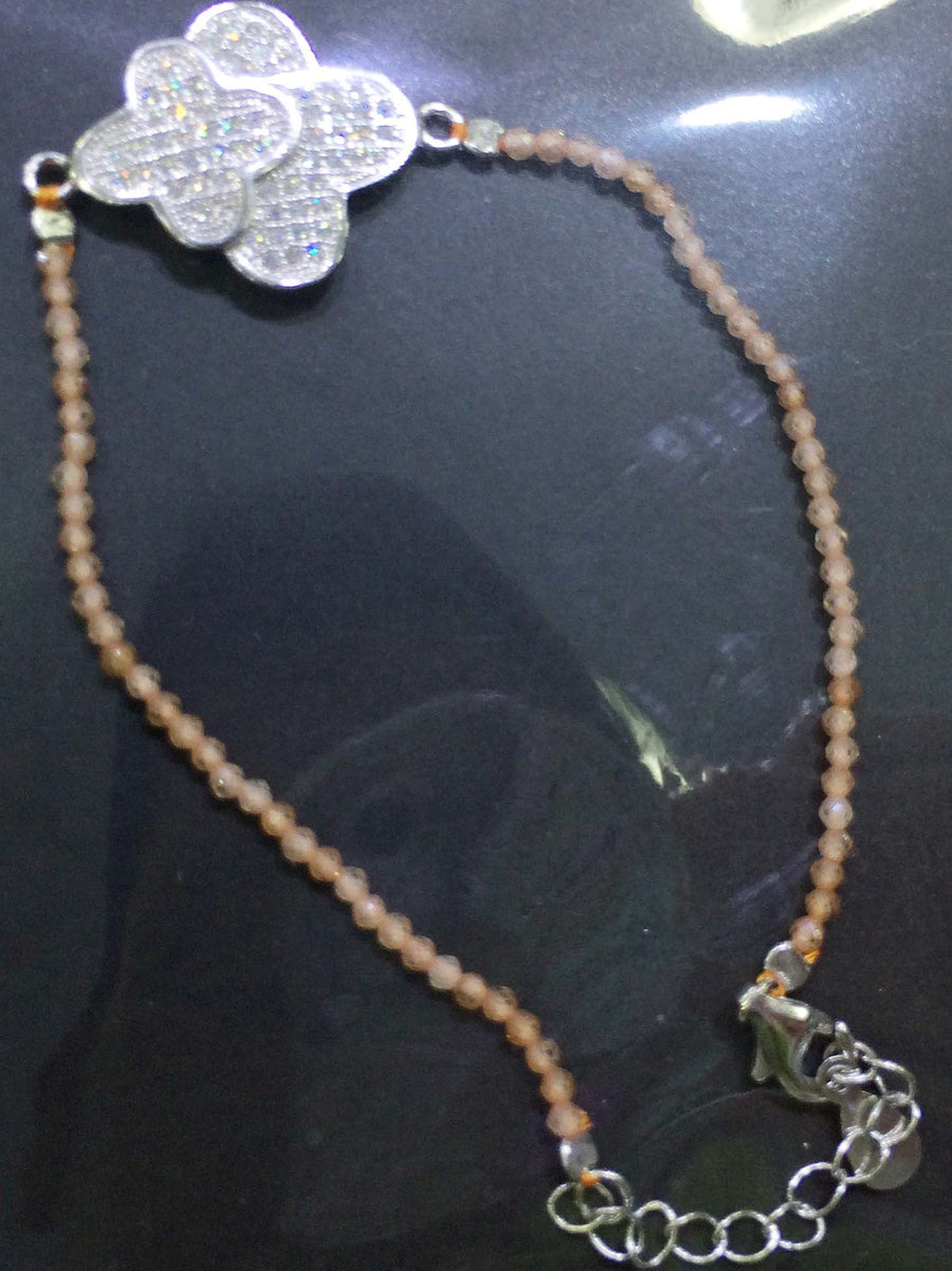 Bracelet of sterling silver metal and natural stone