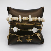 Shell and Tropical Charm Gold Layered Bracelet Stack Set
